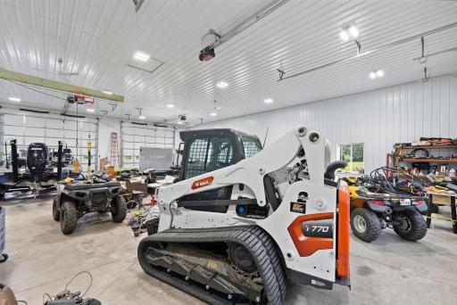 Attached garage, overhead doors, fully finished, extra lighting -- it's pretty maxed out for the garage!