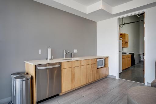 The rooftop level features an indoor party room and catering area.