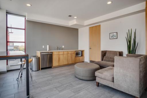 The rooftop level features an indoor party room and catering area.