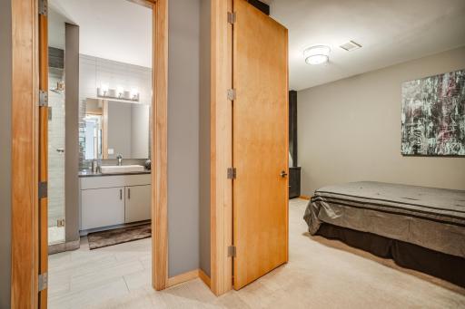 The designer Â¾ bathroom is conveniently situated near the second bedroom.