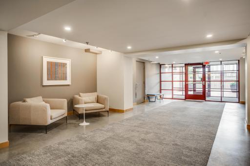 The inviting back lobby leading to the guest parking lot.