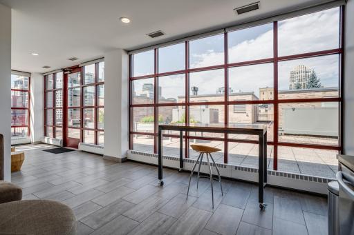 The rooftop level features an indoor party room and catering area.
