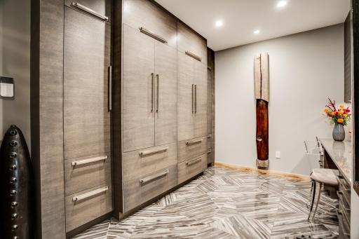 The main level includes a den that could flex as an office and/or guest space.