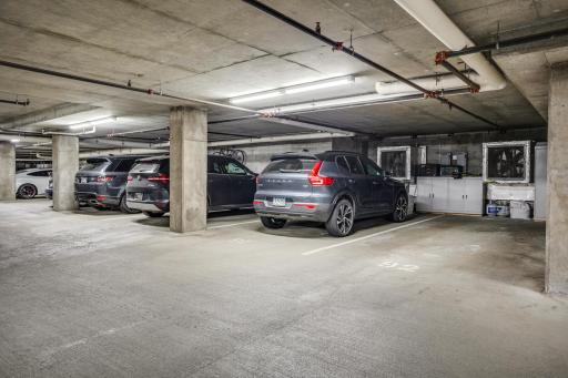 Two underground heated parking spaces with storage cabinets near the elevator are included.