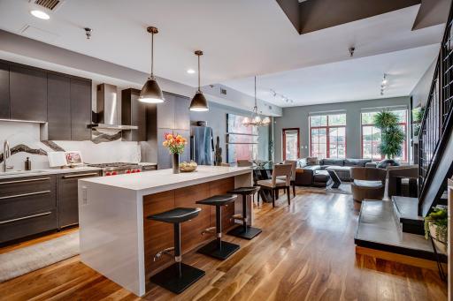 An exquisitely remodeled two-story residence at Stone Arch Lofts, this 2BD + den/office, 3BA home offers sophisticated living, exceptional custom finishes and a private patio in the heart of the historic Mill District.
