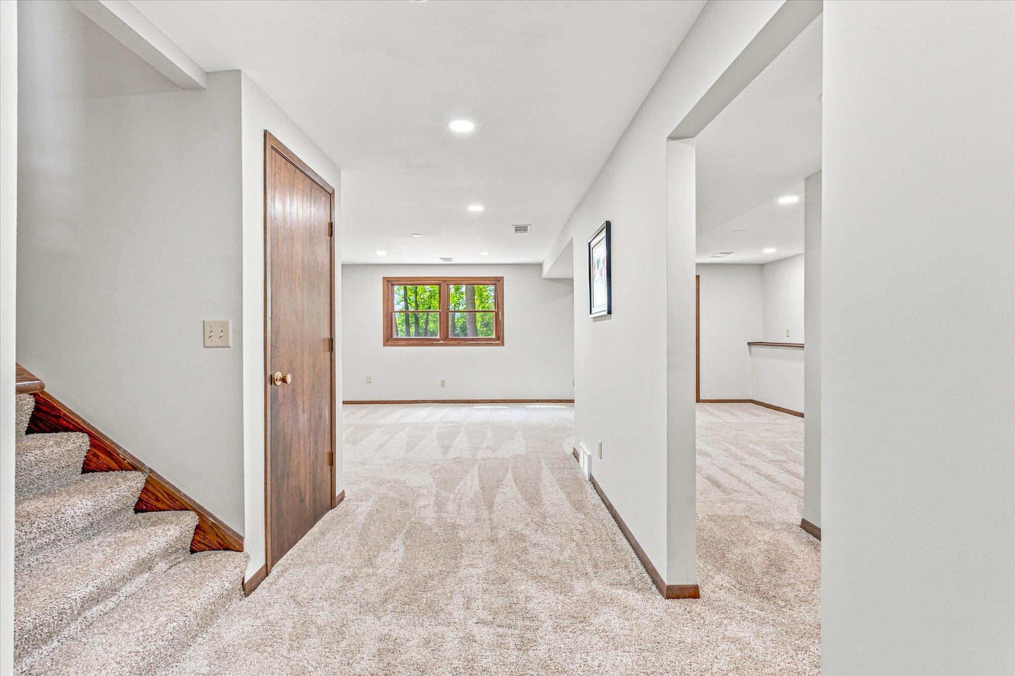 stairs to the left, lower level bath to the right