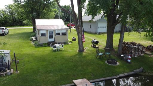Move-in ready lake cabin with a rare level lot! Enjoy effortless access to the shoreline with no steep hill or stairs. Plenty of green space for yard games, relaxing, and entertaining while taking in peaceful lake views.