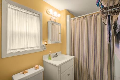 Freshen up after a day on the lake. This clean, functional full bath provides everything you need for comfortable weekends or extended summer stays at your fully furnished lake retreat.