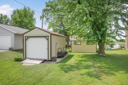 Beautifully maintained with room to relax. Mature shade trees, a level yard, and easy access to the lake create the perfect setting for yard games, cookouts, campfires, and making lifelong memories.