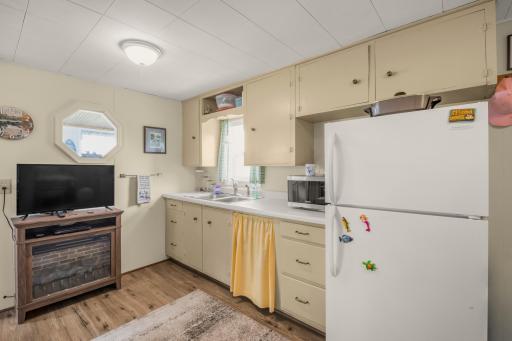 Everything you need for carefree weekends at the lake. This functional kitchen offers ample cabinet storage and comes fully equipped, so you can spend less time preparing and more time enjoying the water, campfires, and lakefront lifestyle.