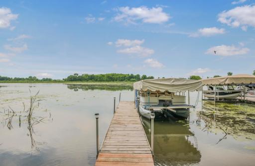From cabin to cruise in seconds. The level shoreline makes it easy to stroll to your private dock, hop on the included pontoon, and spend the day exploring beautiful Clear Lake.