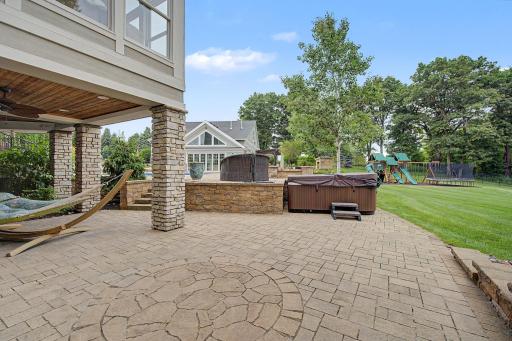 Lower Patio Area with Hot Tub | 15471 Dogwood St NW