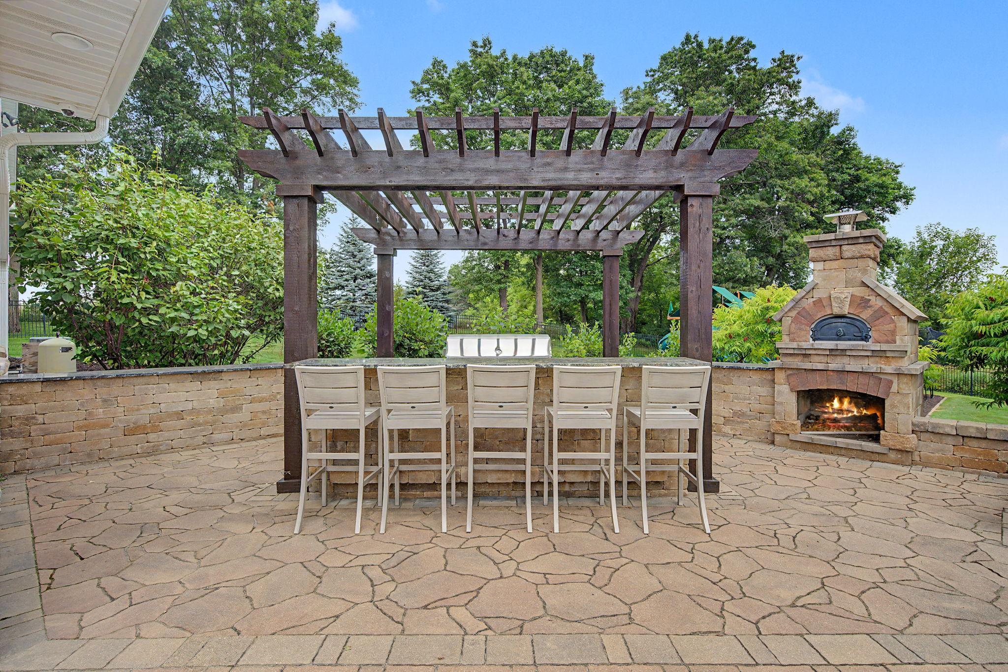 Outdoor Kitchen with Pizza Oven | 15471 Dogwood St NW