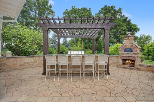 Outdoor Kitchen with Pizza Oven | 15471 Dogwood St NW
