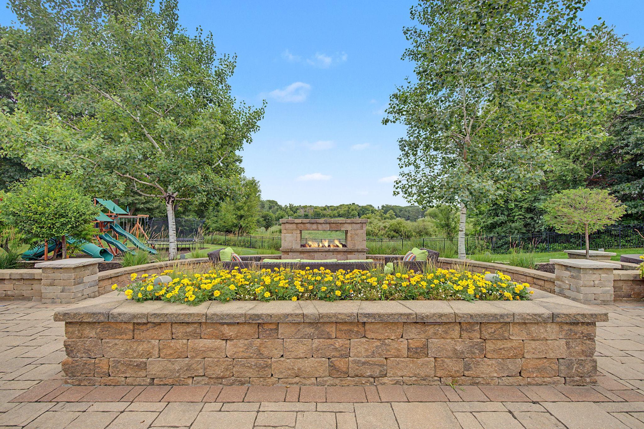 Patio Sitting Area with Fire Place | 15471 Dogwood St NW