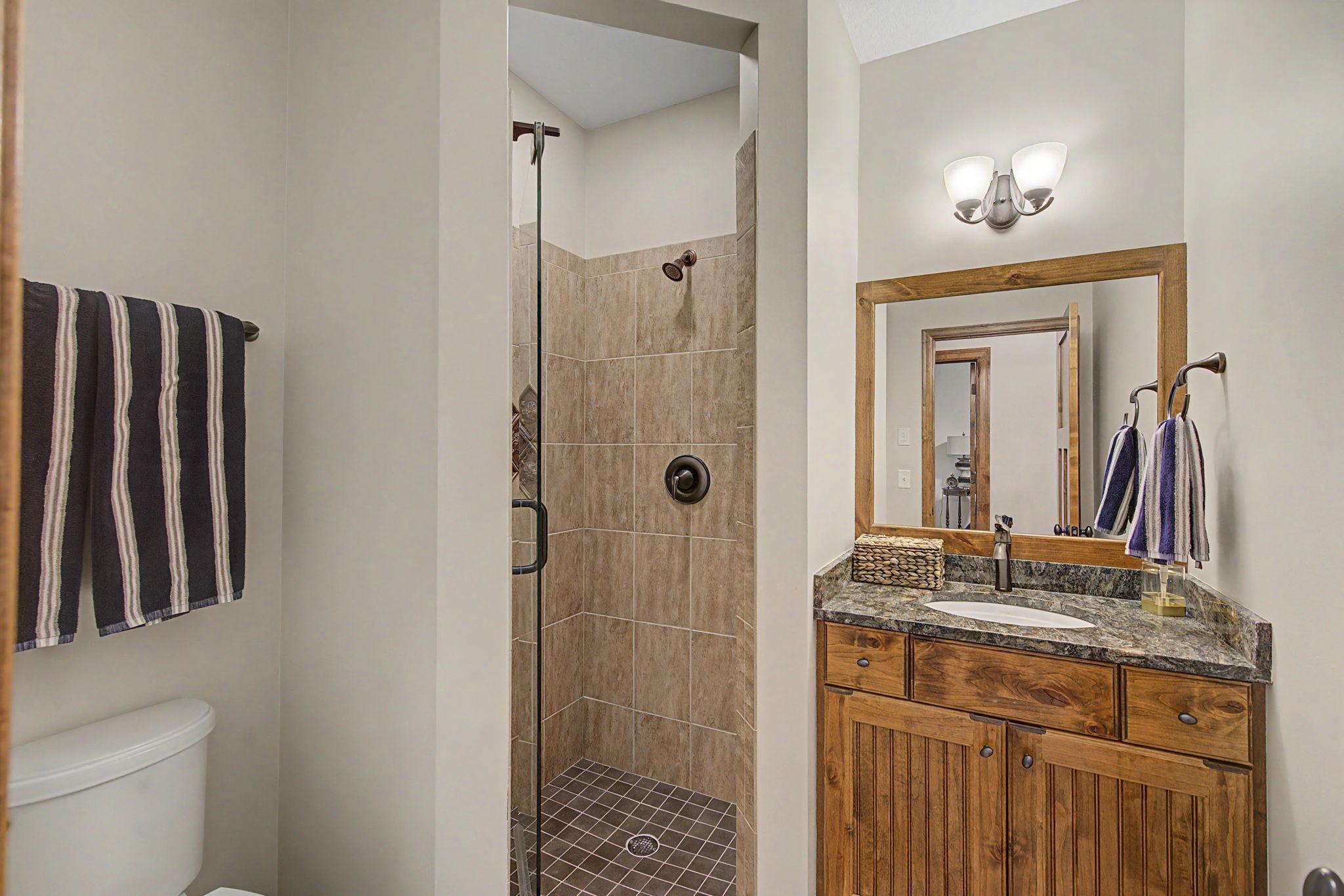 Lower Level Bathroom | 15471 Dogwood St NW