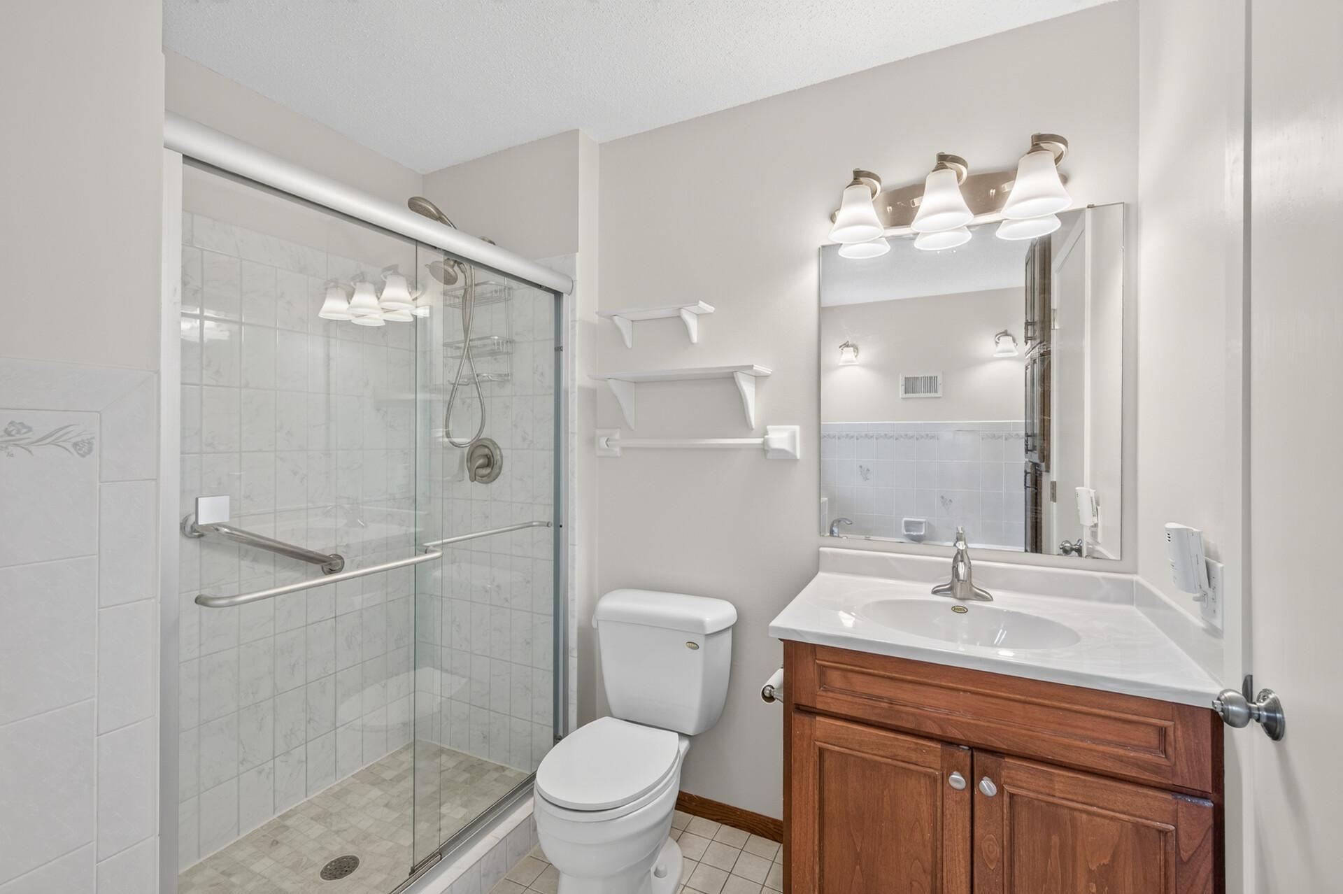 Primary bath with seperate shower and jetted tub