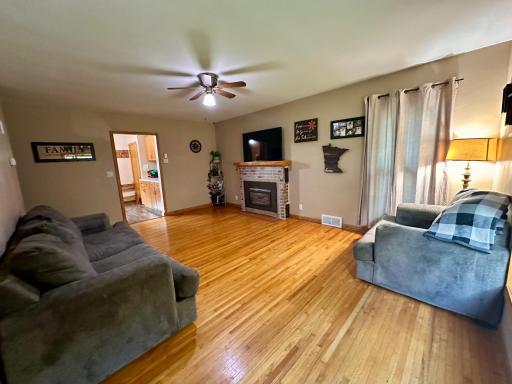 Hardwood floors throughout the main level make it easy to add your own vibe, just add area rug!
