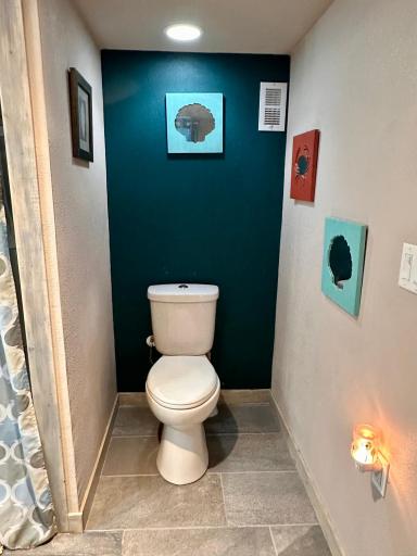 High efficiency stool features water usage options.