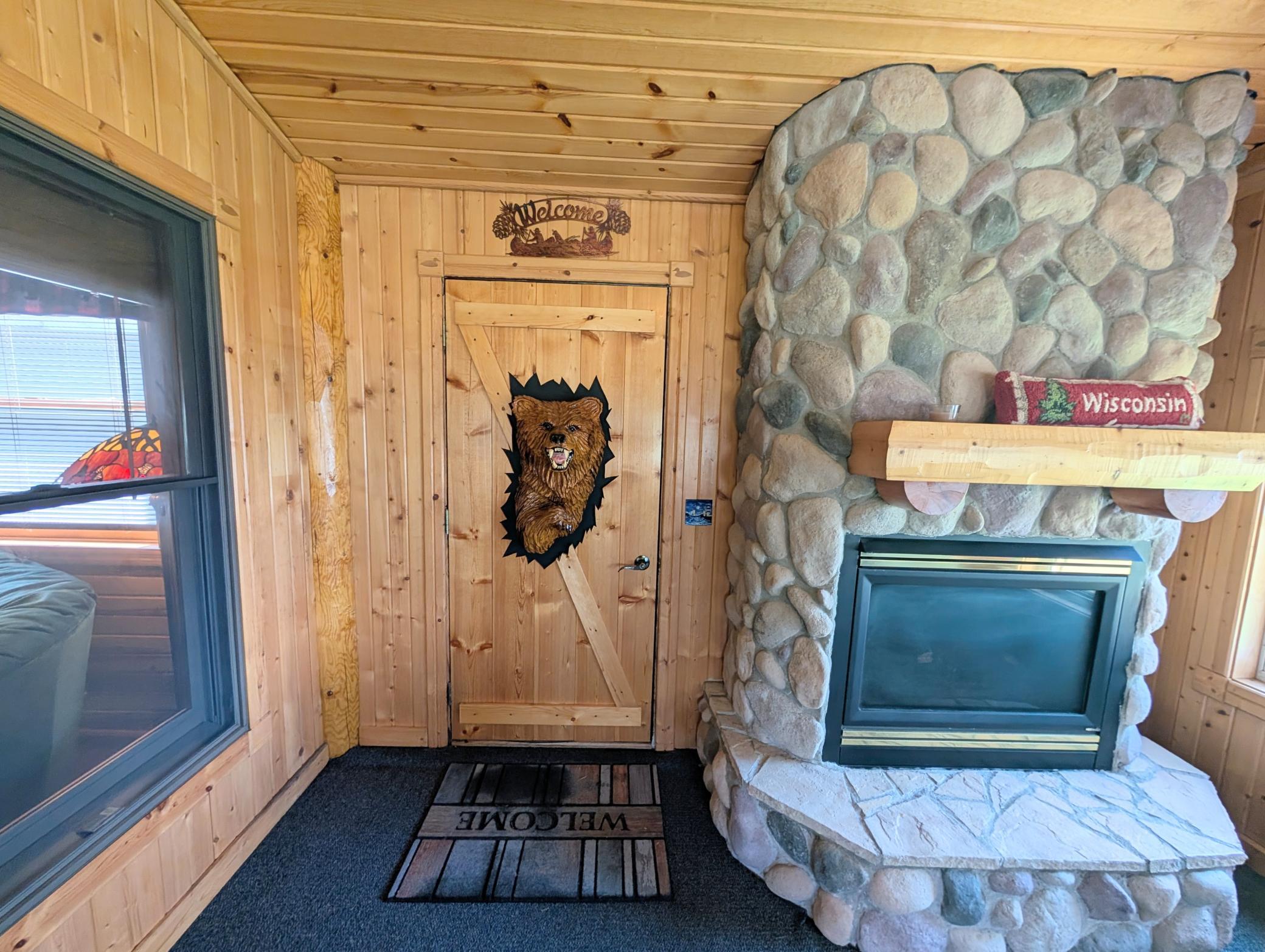 door and fire place in Clayton Wi Home.jpg