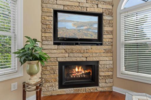 Fireplace with floor to ceiling stone surround