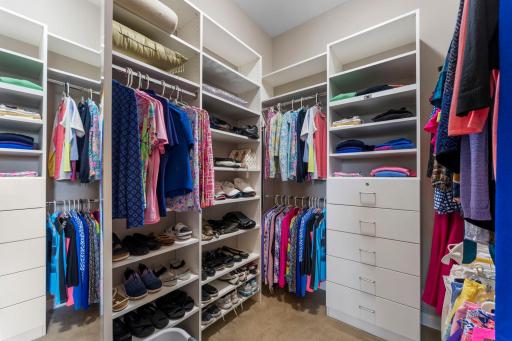 Primary bedroom walk-in closet