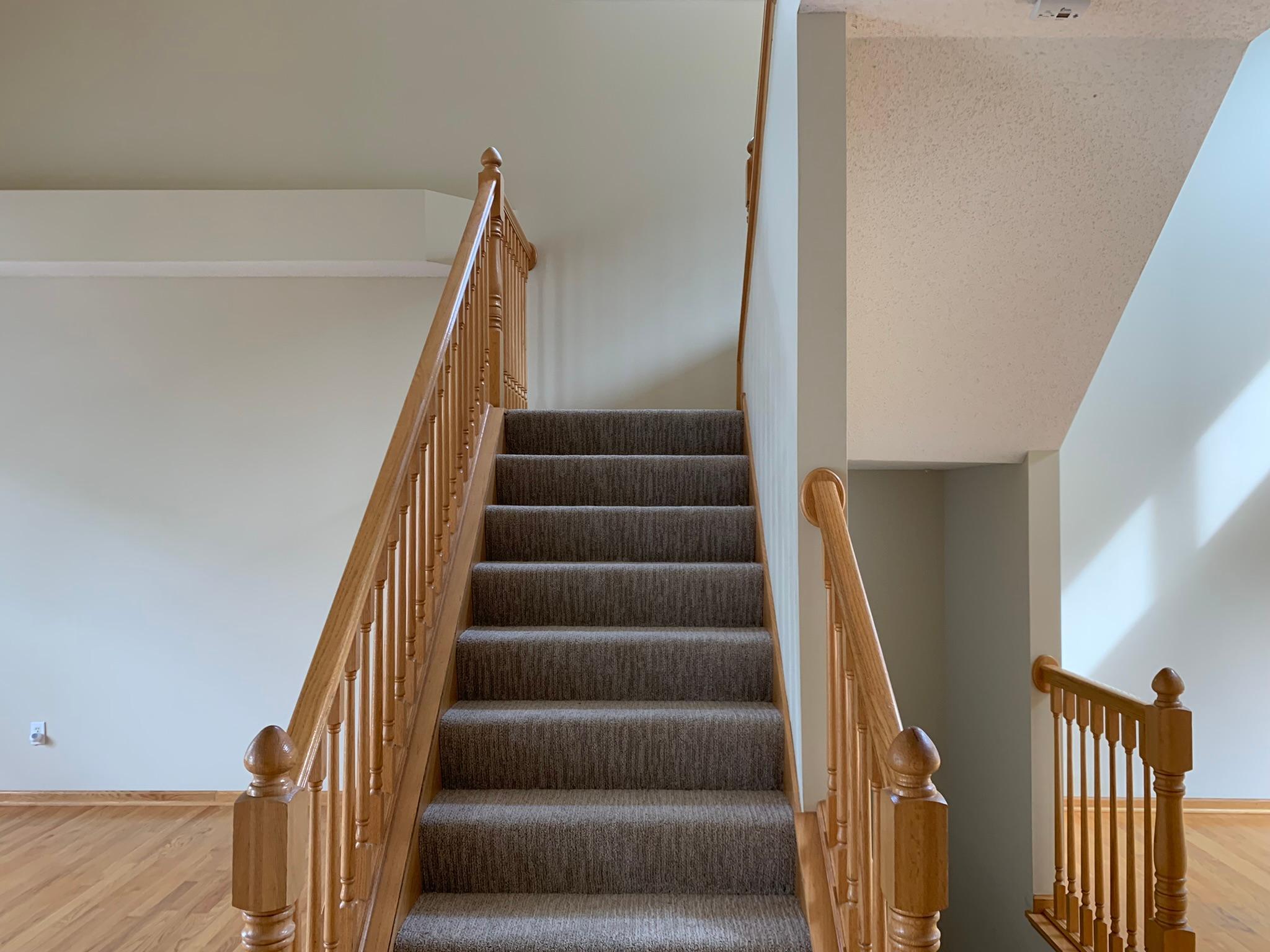 11 - Open staircase to upper level.JPEG