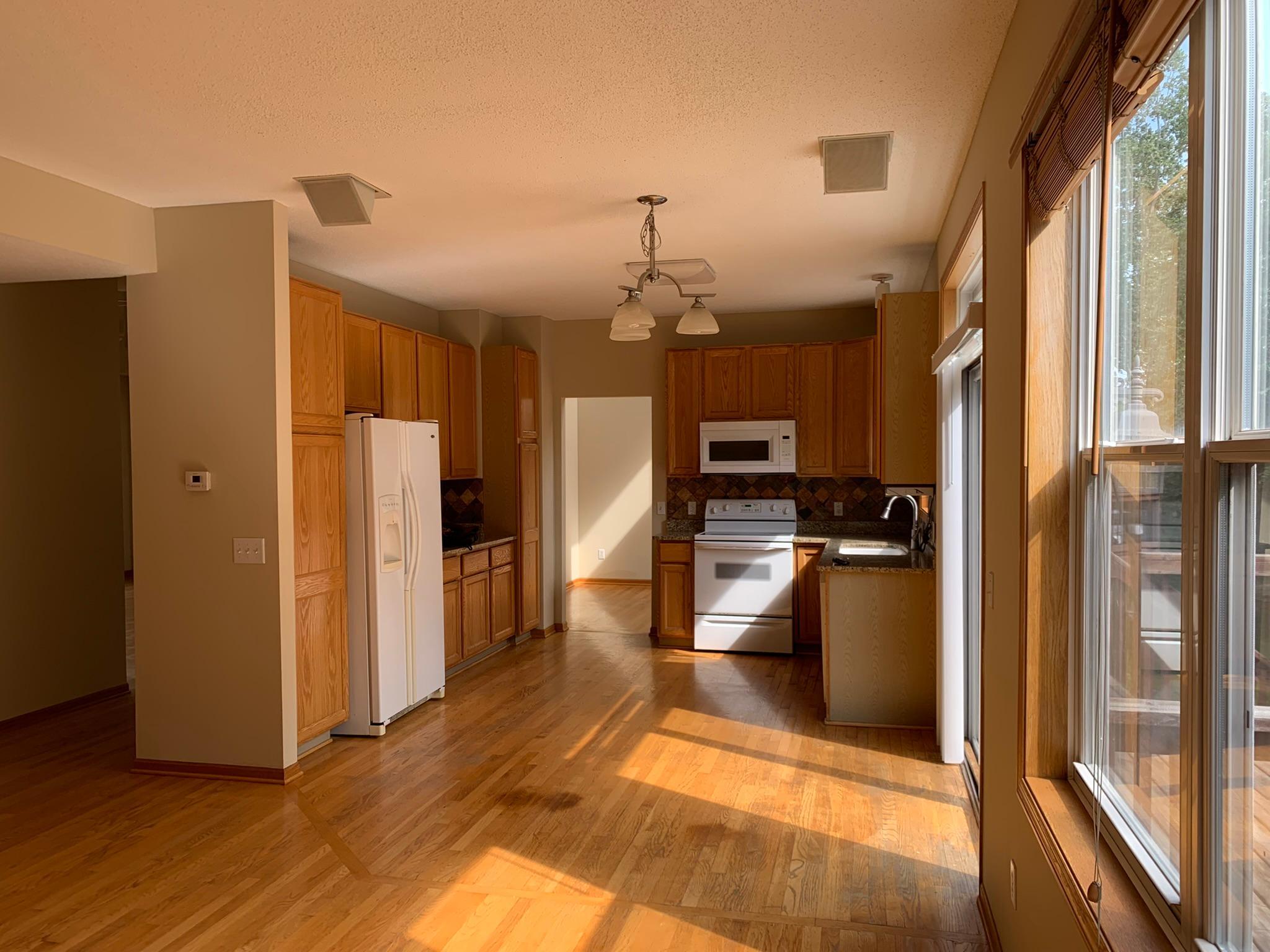 8- Plenty of cooking and storage space in this kitchen - Patio door opens to large deck.JPEG