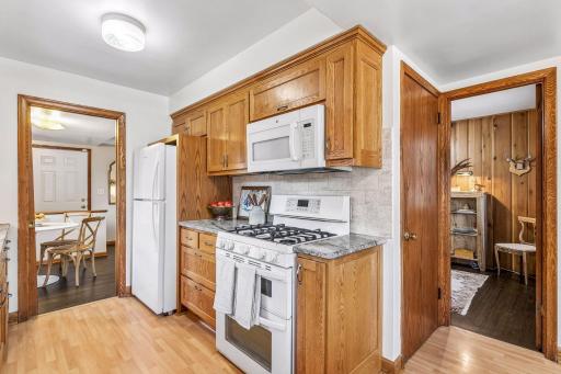 Peeking from kitchen towards third bedroom