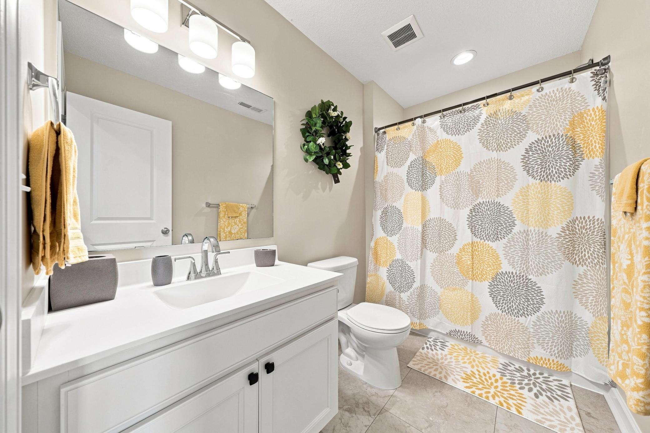 There is also a full bathroom located in the upper level with new faucets