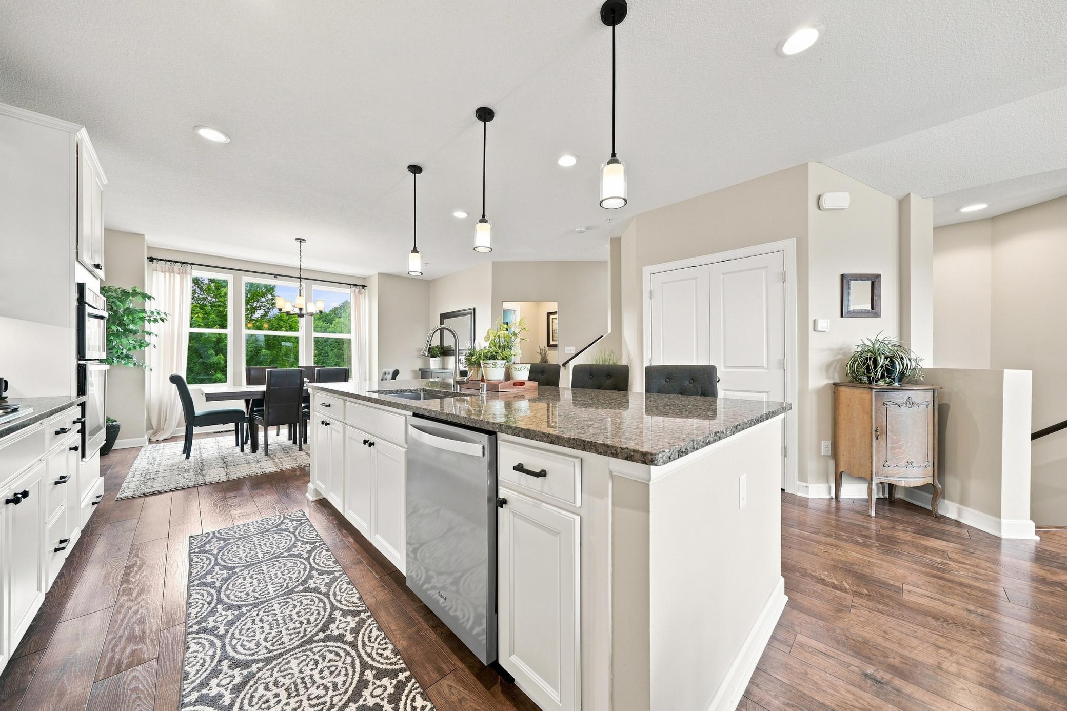 Convenient dishwasher and sink in the center island and a brand new faucet