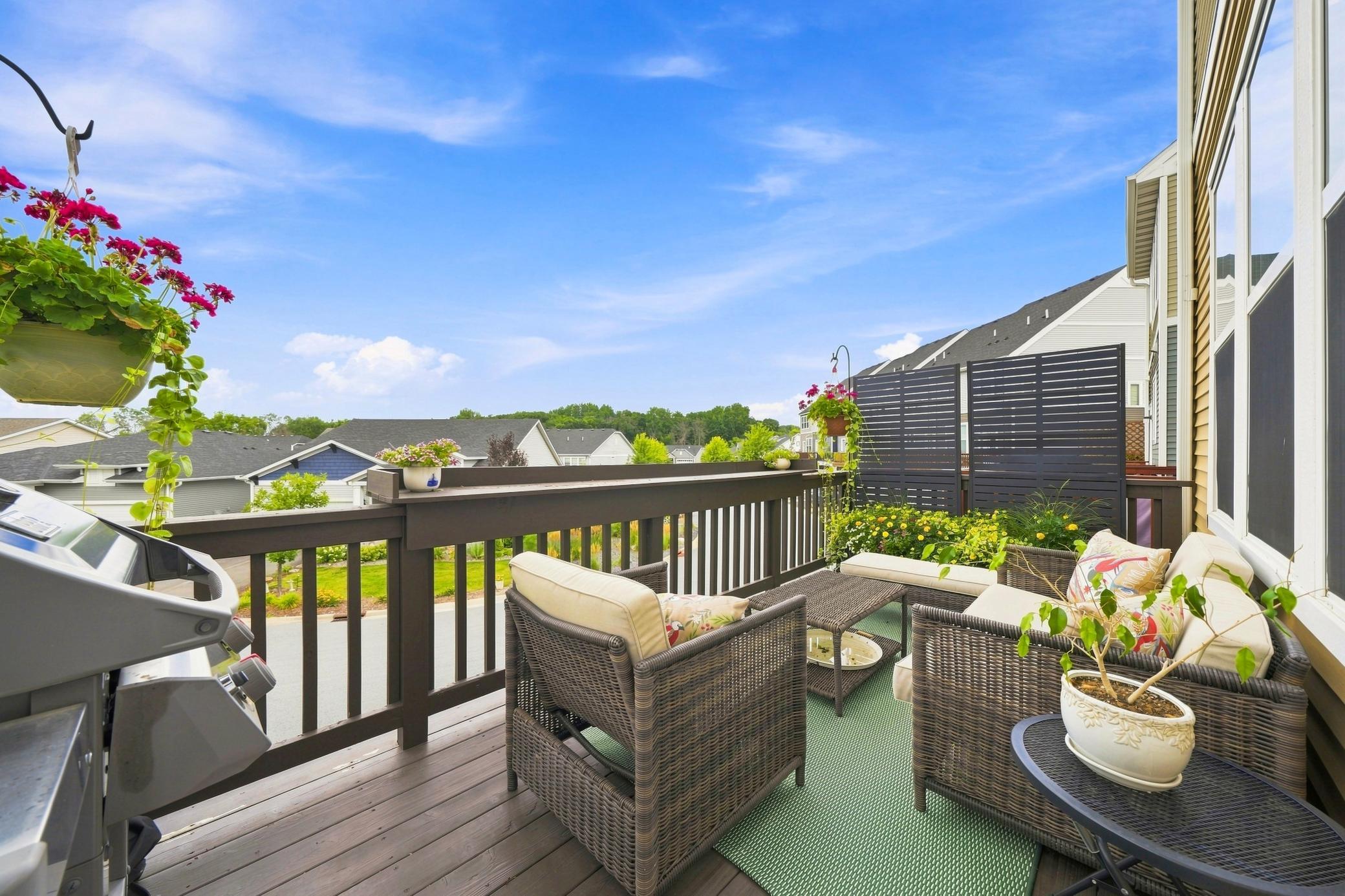 From the living room you step out onto the refinished deck to enjoy your morning coffee