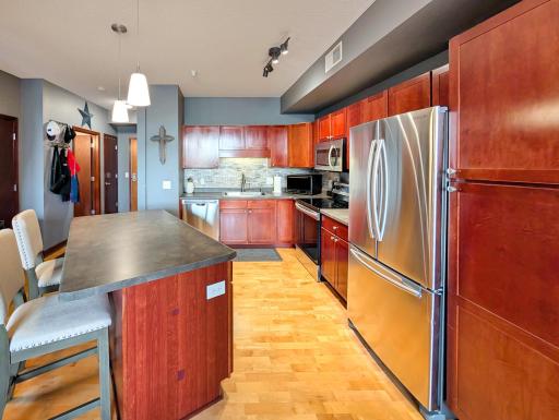 Island offers convenient built-in dining space.