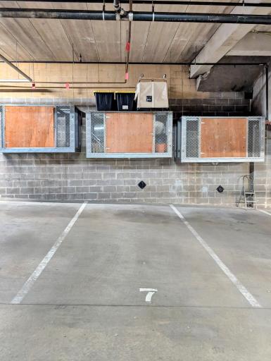 Parking space and storage unit pictured included in association fee.