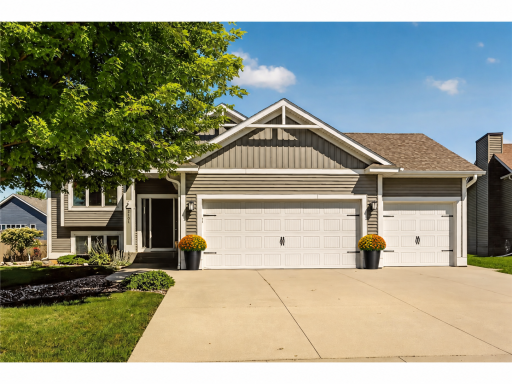 Virtually Enhanced front pic with garage door.png
