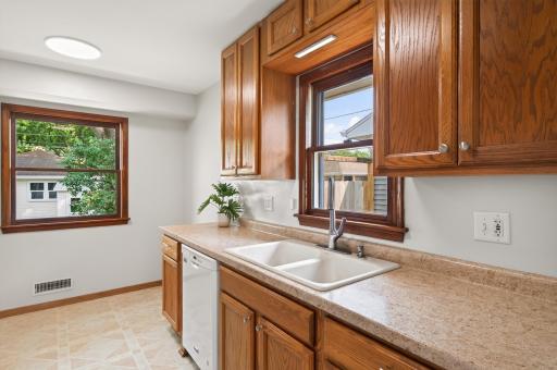 Kitchen updates include new kitchen faucet, garbage disposal and under counter lighting