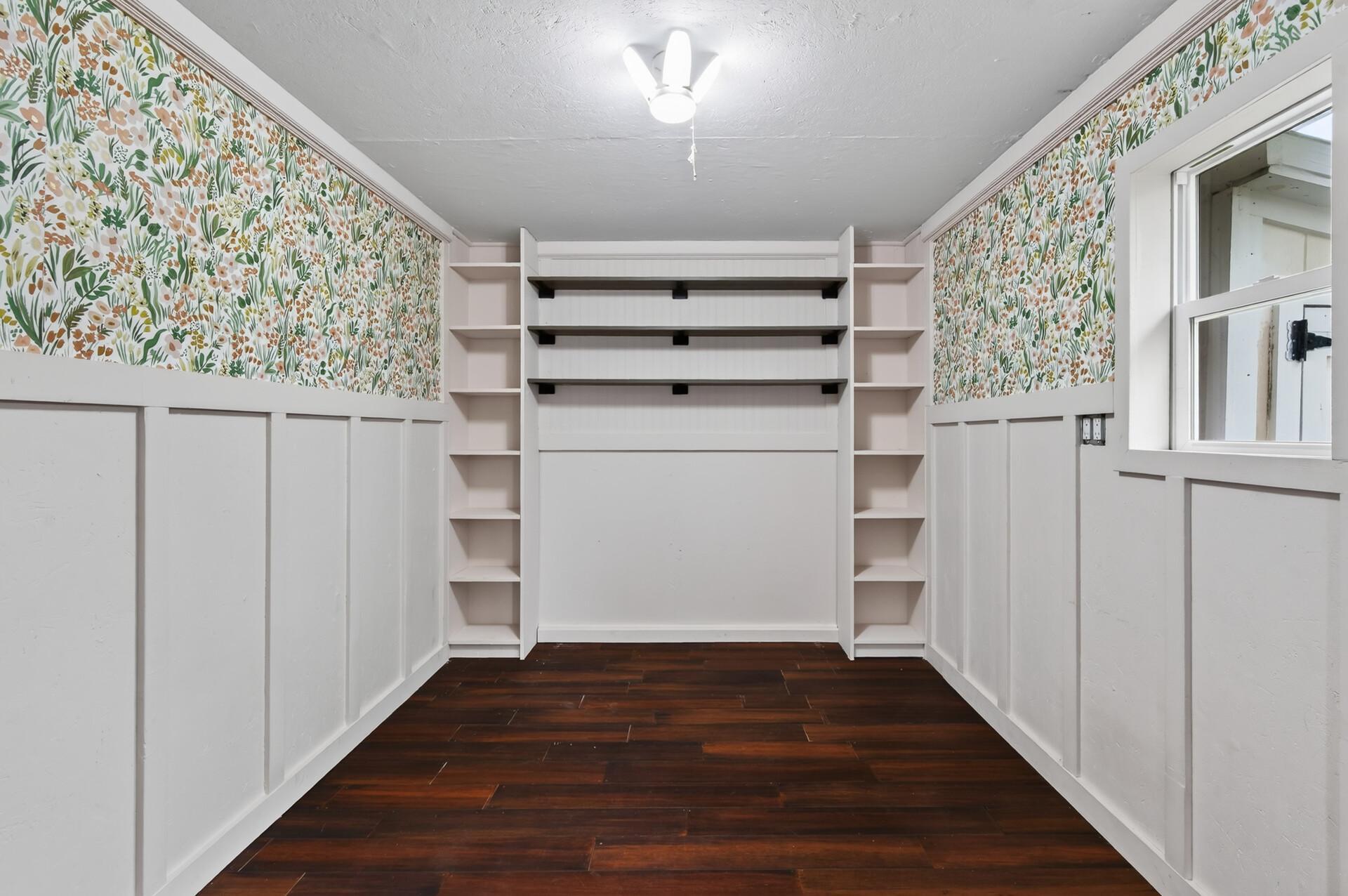 One of the car stalls has been converted to this cute room - the walls are temporary so you can easily change it back to a full garage