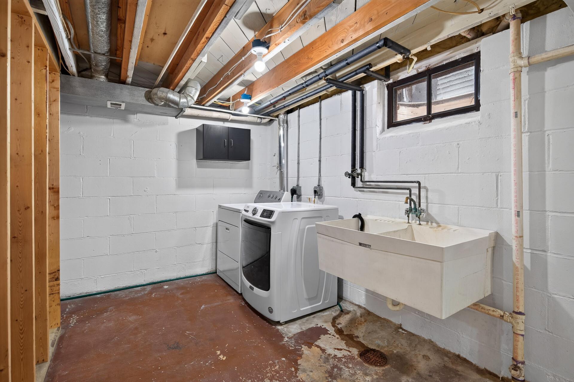 Laundry area - so much space to build cabinets or a large folding table.