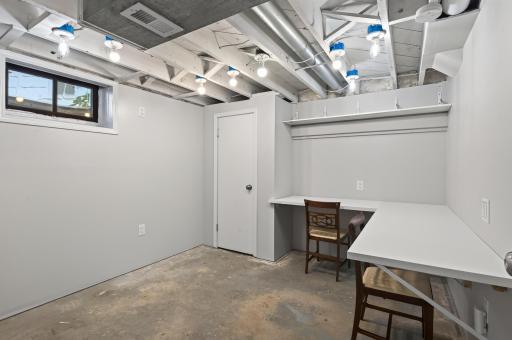 The partially finished office provides flexible space and could become a 4th bedroom with the addition of an egress window.