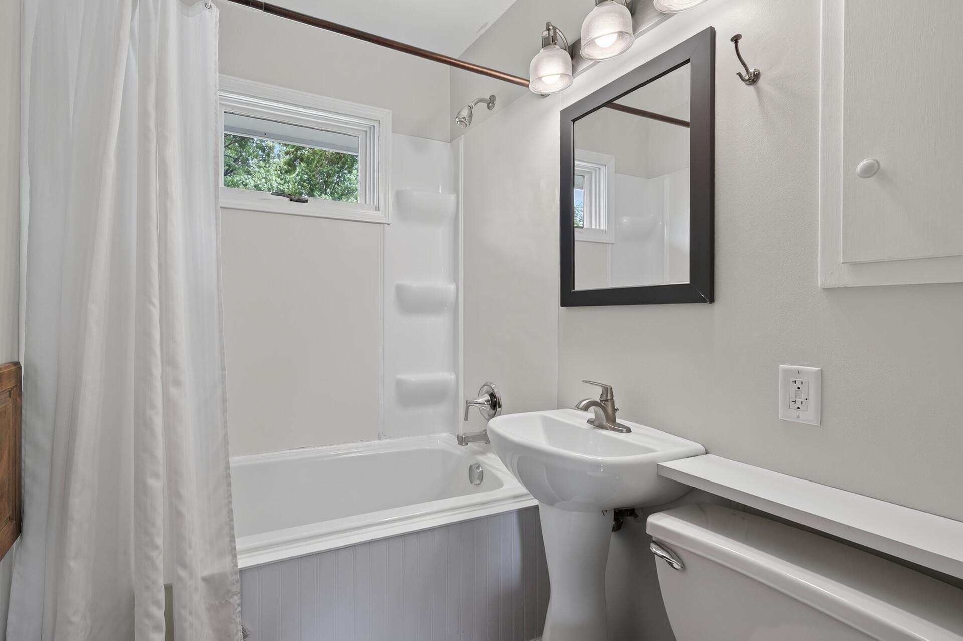 Bathroom updates include - soaker bathtub, flooring, sink, humidity sensing fan and more.