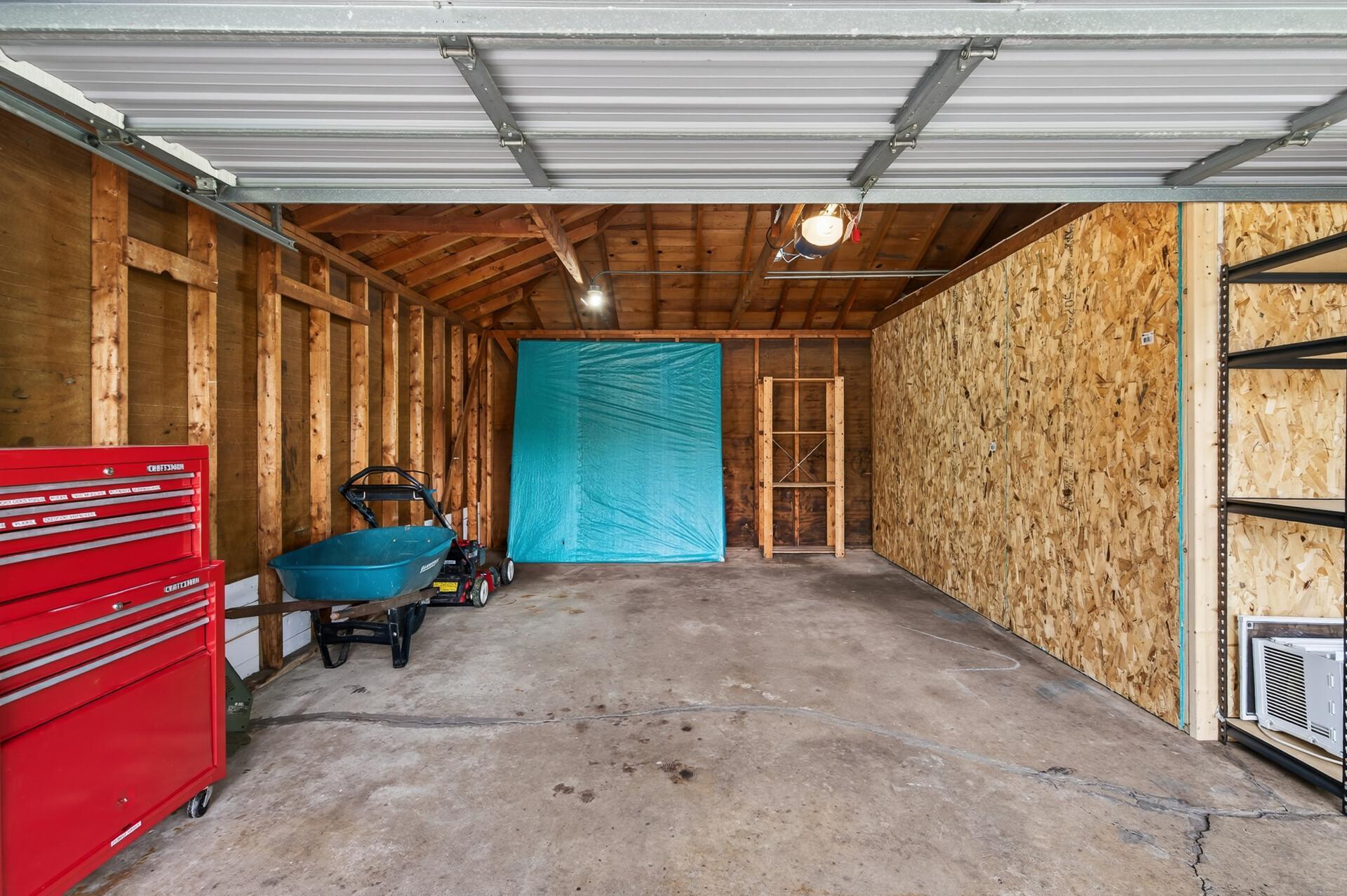 A full size van fits in the garage even with the addition of the room (which can easily be removed)