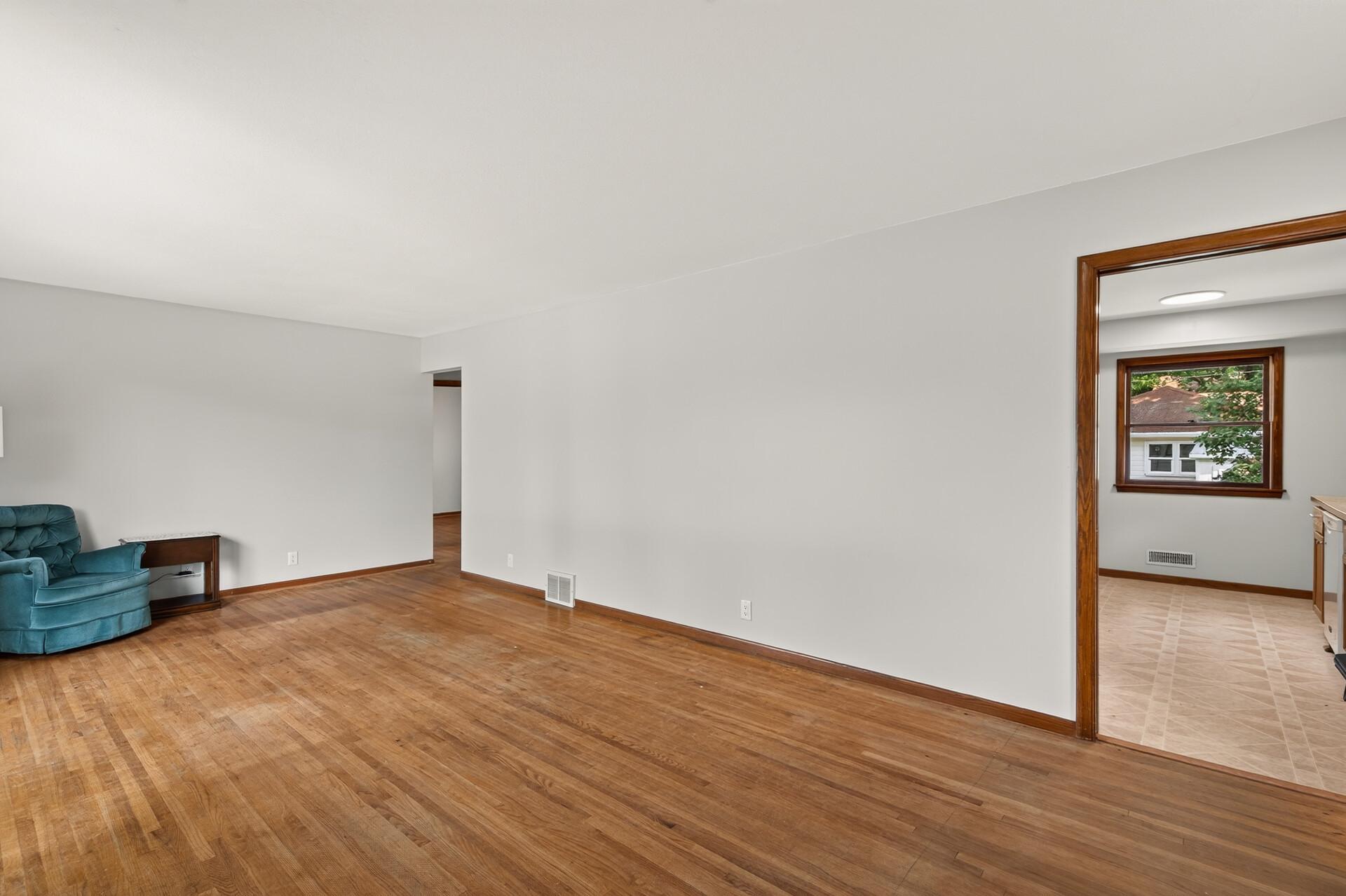 The original hardwood flooring is throughout most of the home. There is no carpet in any rooms.