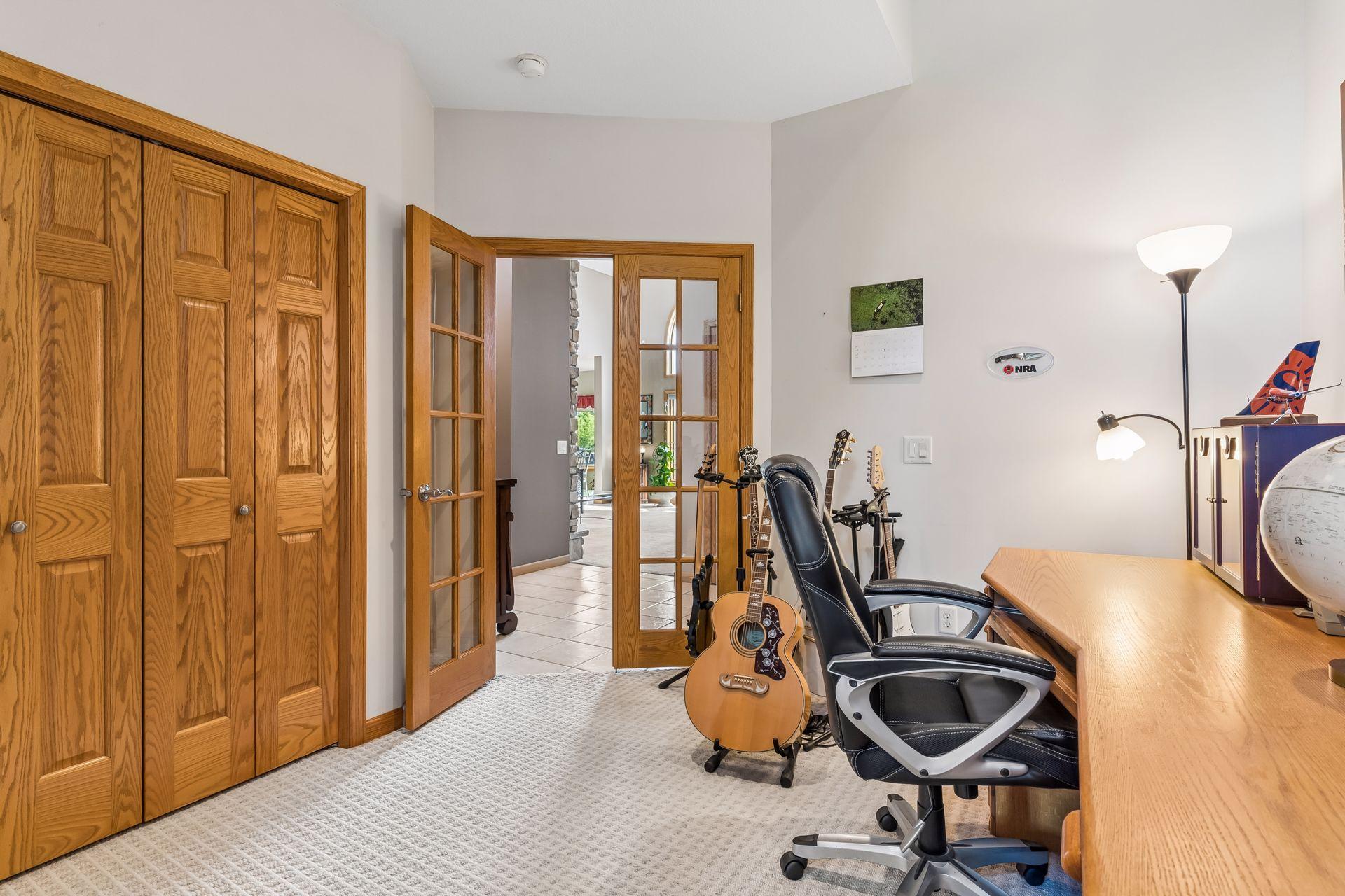 A double closet and elegant French doors round out this space.