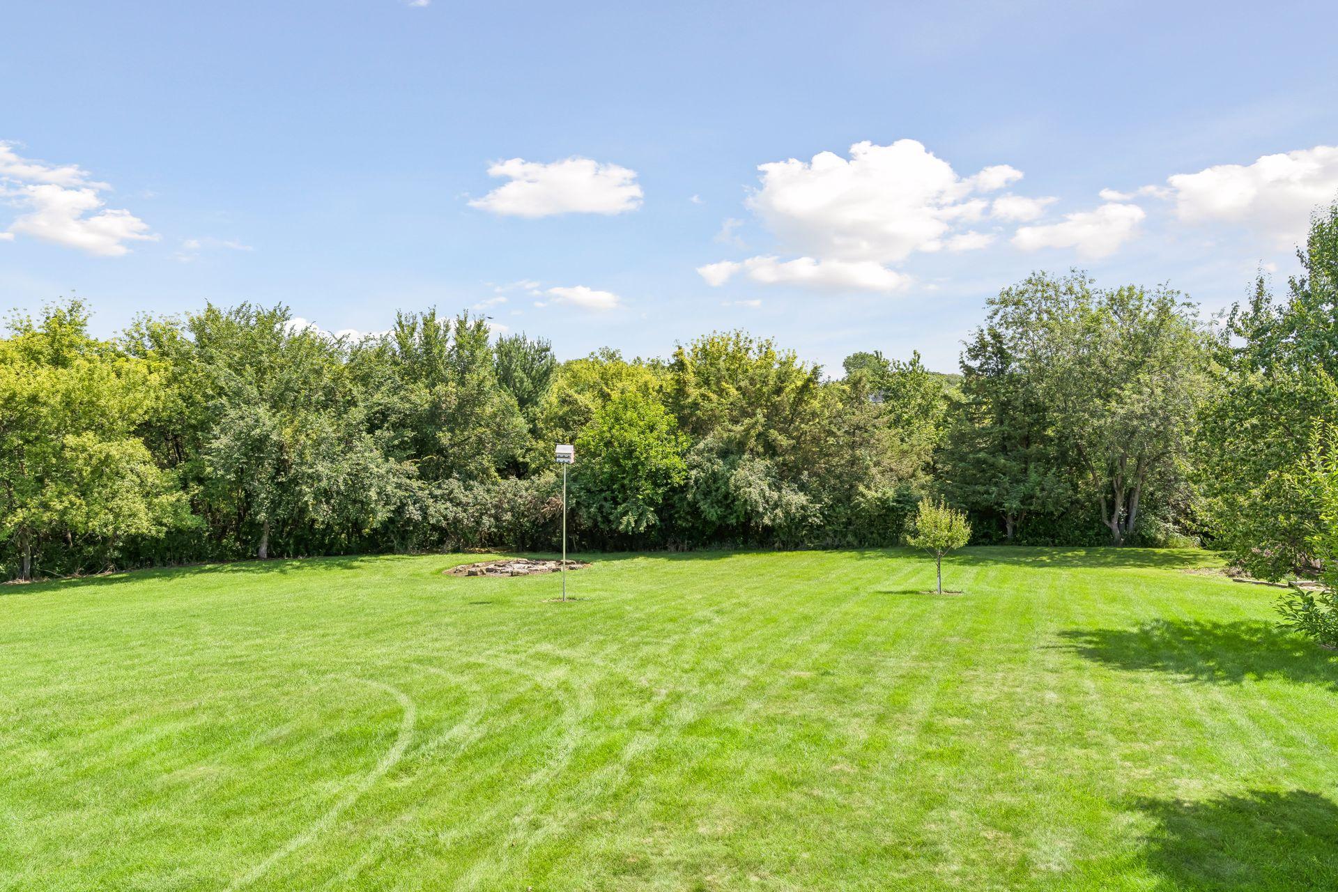 Step outside and enjoy a beautiful natural backdrop with plenty of green space, mature trees, and room to relax or explore.