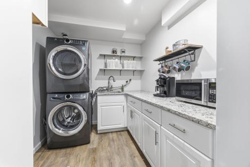 Huge laundry room with folding counter