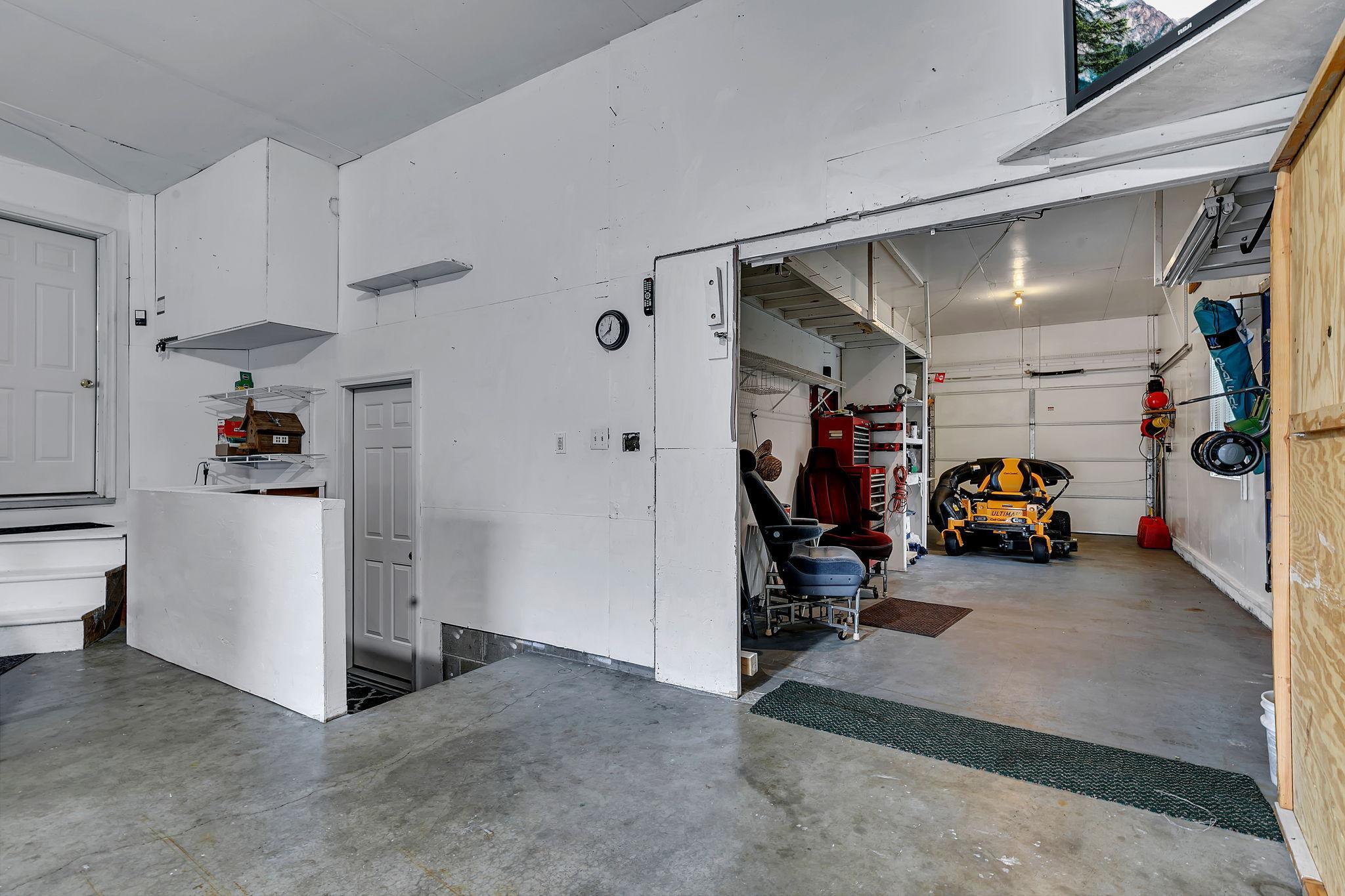 Access to lower level & 10x27 garage
