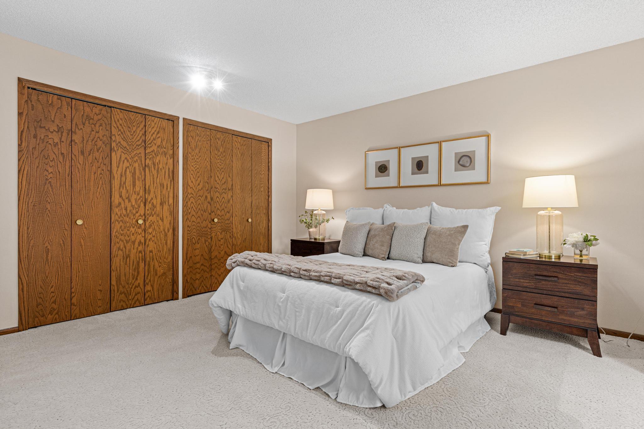 Owners suite with multiple closet spaces, sitting room and full bathroom