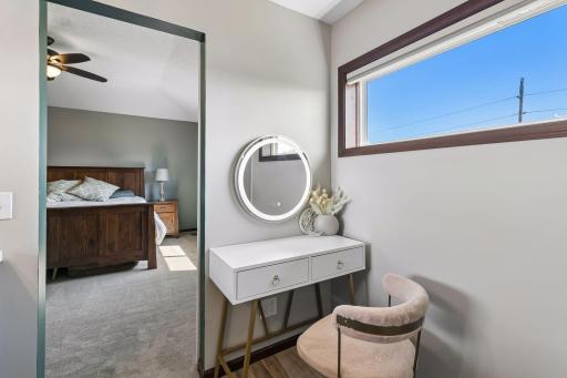 Darling makeup nook in primary bath (table and mirror to stay)