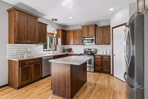 Gorgeous open kitchen with spacious island and breakfast bar