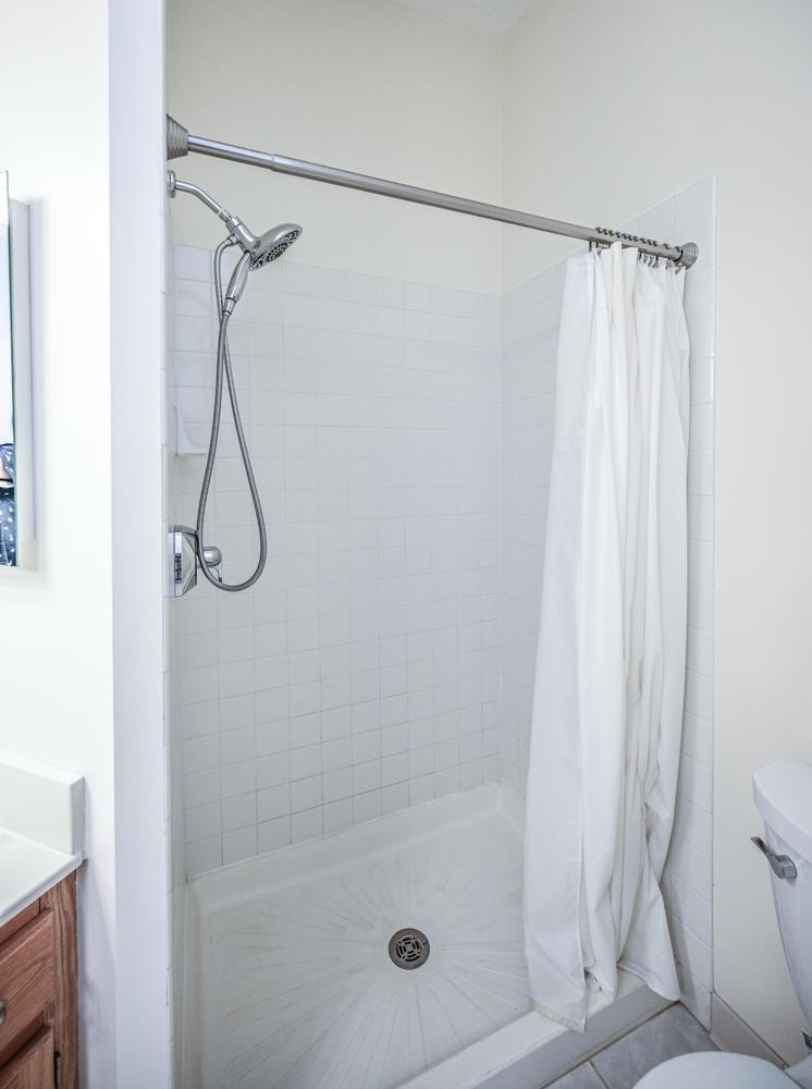 The walk-in shower in the primary bathroom